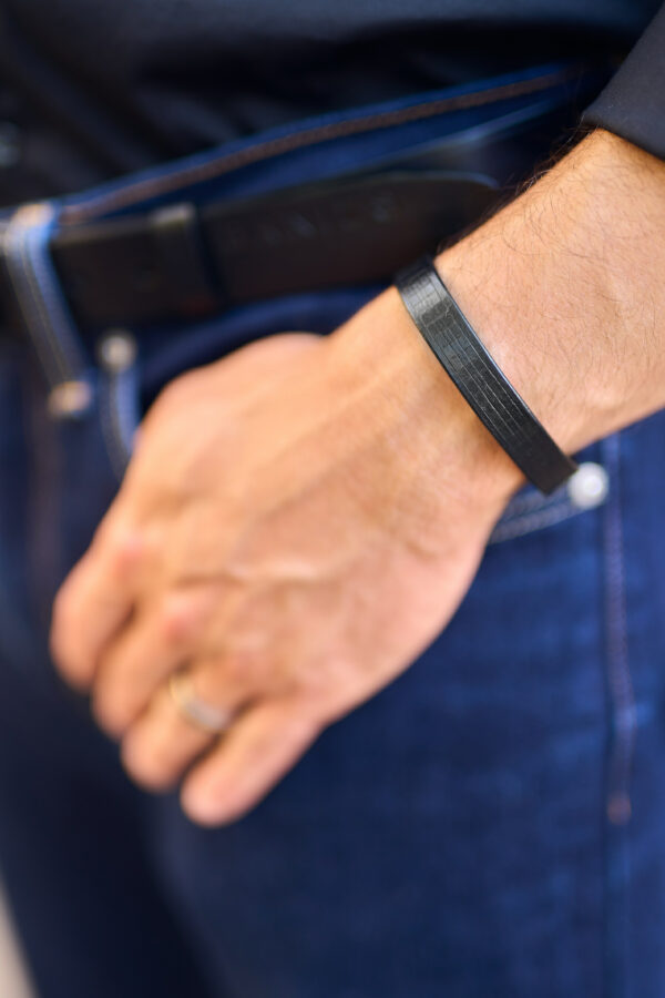Model wears: ALEX bracelet - Black and ADAM belt - Black - BANIZS
