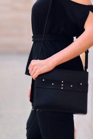 Model wears: CRISTIANE bag - Black - BANIZS
