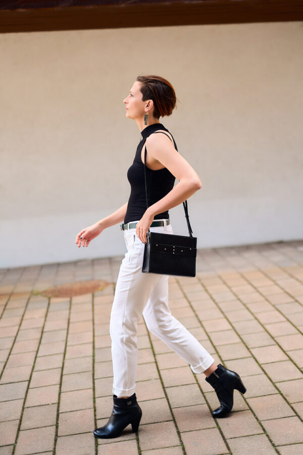 Model wears: CRISTIANE bag - Black, STEFANIE belt - Green, EMMA earrings - Green - BANIZS