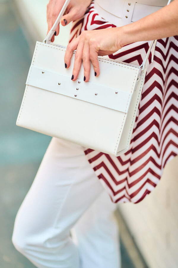 Model wears: CRISTIANE bag - White and CRISTIANE belt - White - BANIZS
