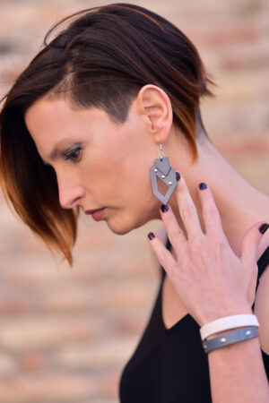 Model wears: GIULIANA - bold earrings - Gray, HELENA bracelet - White - BANIZS