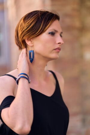 Model wears: GIULIANA earrings - Blue and GIULIANA bracelet - Blue - BANIZS