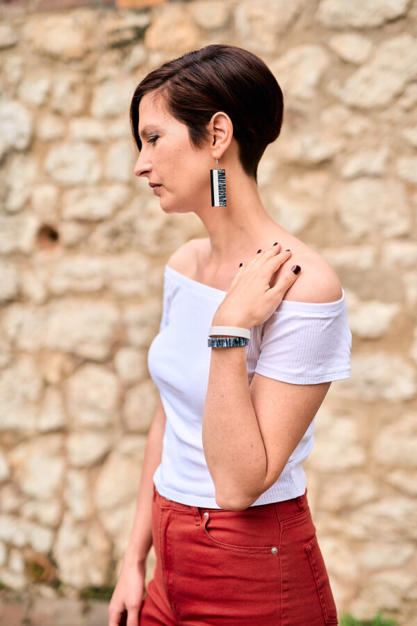 Layered black - white leather earrings and double bracelet