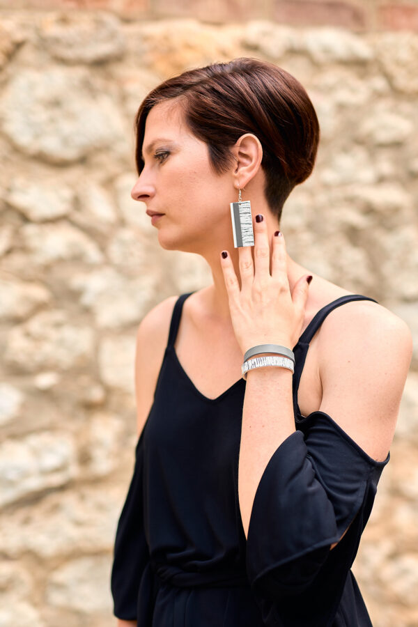 Layered gray leather earrings and double bracelet