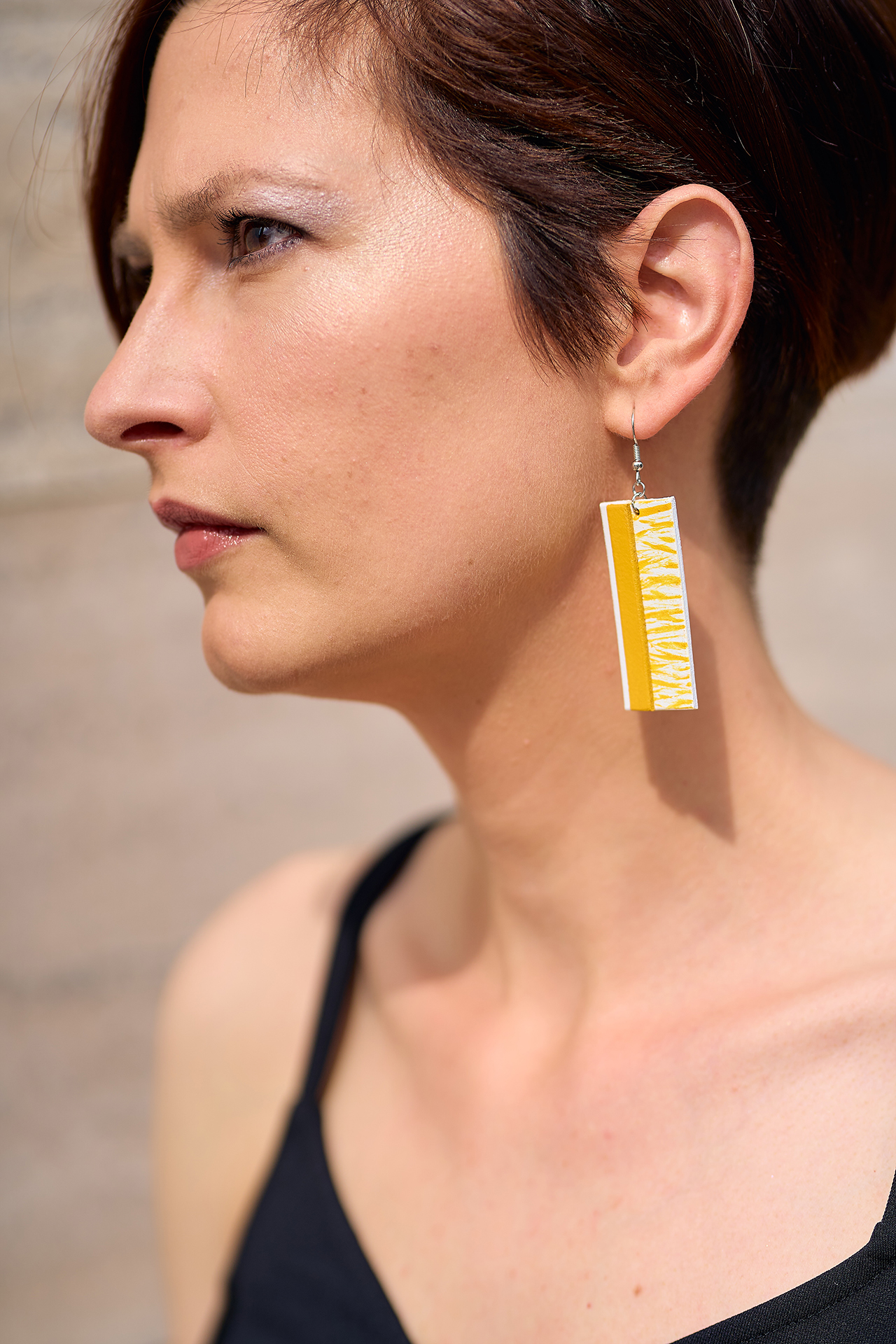 Layered leather earrings yellow