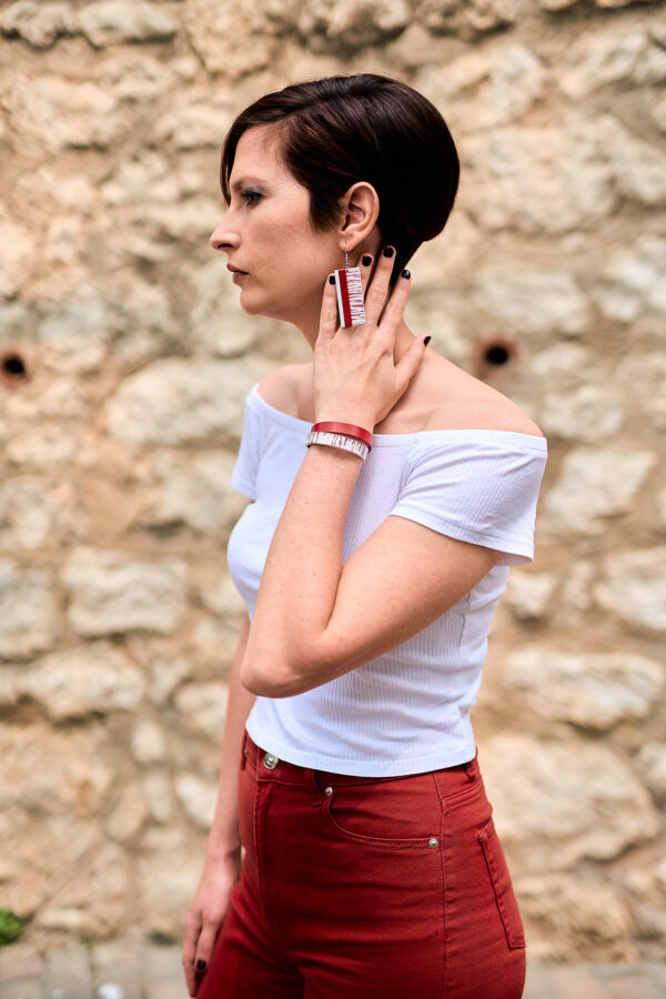 Layered red leather earrings and double bracelet