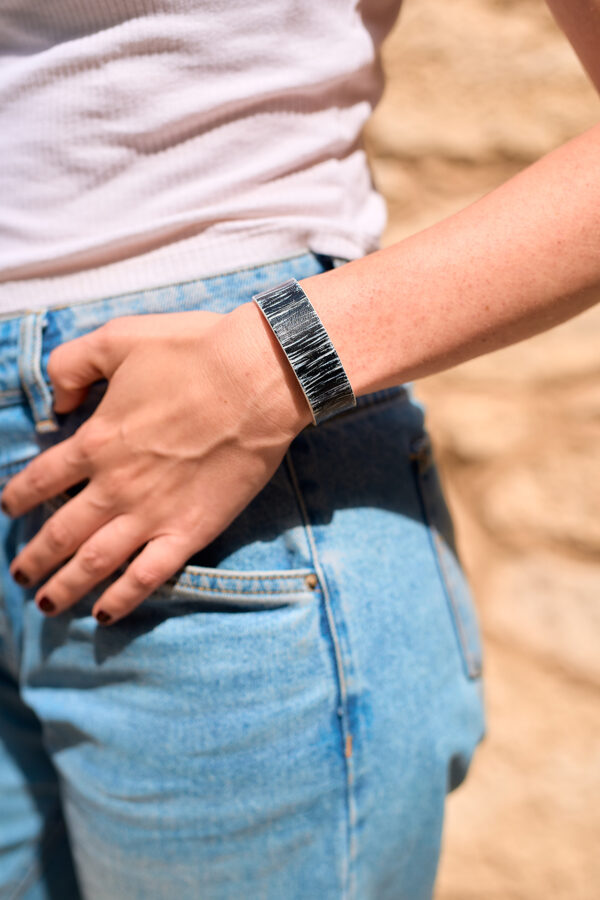 Patterned black - white leather bracelet