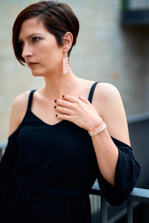 Patterned leather bracelet and earrings orange