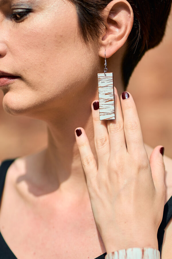 Patterned leather earrings brown